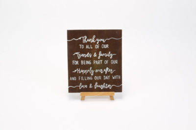 Dark wooden sign- "Thank you to all of our friends + family ...."